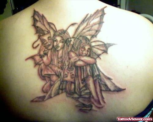 Fairy Smiling Crying Tattoo