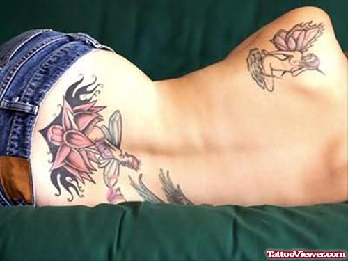 Fairy Tattoo On Lower And Upper Back