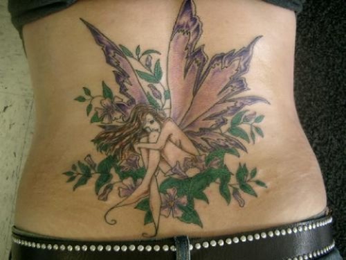 Green Leafs And Fairy Tattoo On Lowerback