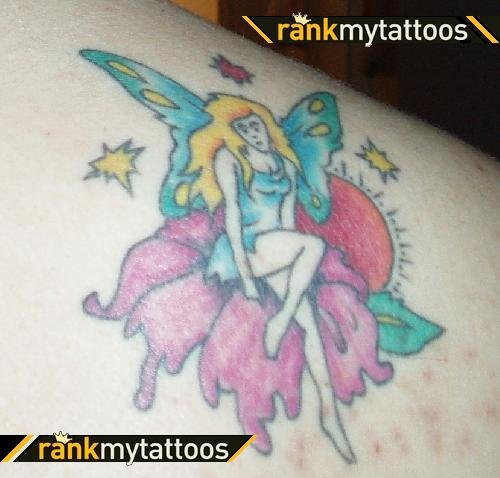 Colored Fairy Sitting On Flower Tattoo