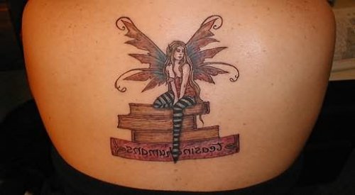 Sitting Fairy Tattoo On Upper Back