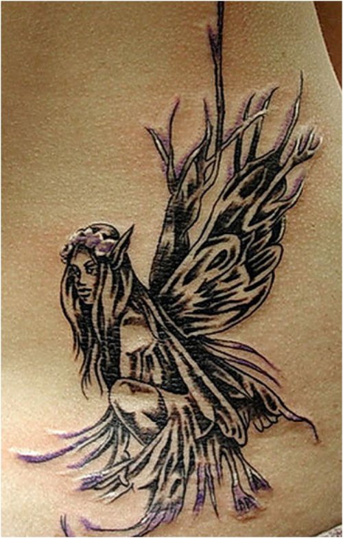Girl With Grey Ink Fairy Tattoo