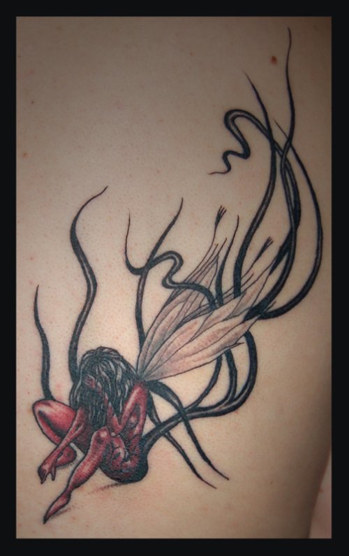 Awesome Red Ink Fairy Tattoo