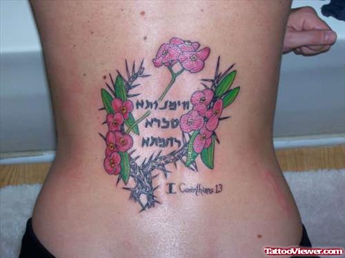 Thorn Flowers And Faith Tattoo On Back