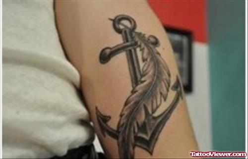 Anchor And Feather Faith Tattoo