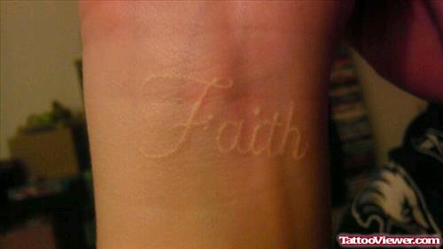 White Ink Faith Tattoo On Wrist