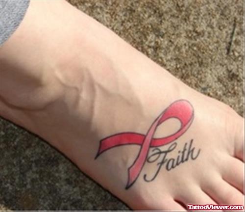 Red Ribbon And Faith Tattoo On Right Foot