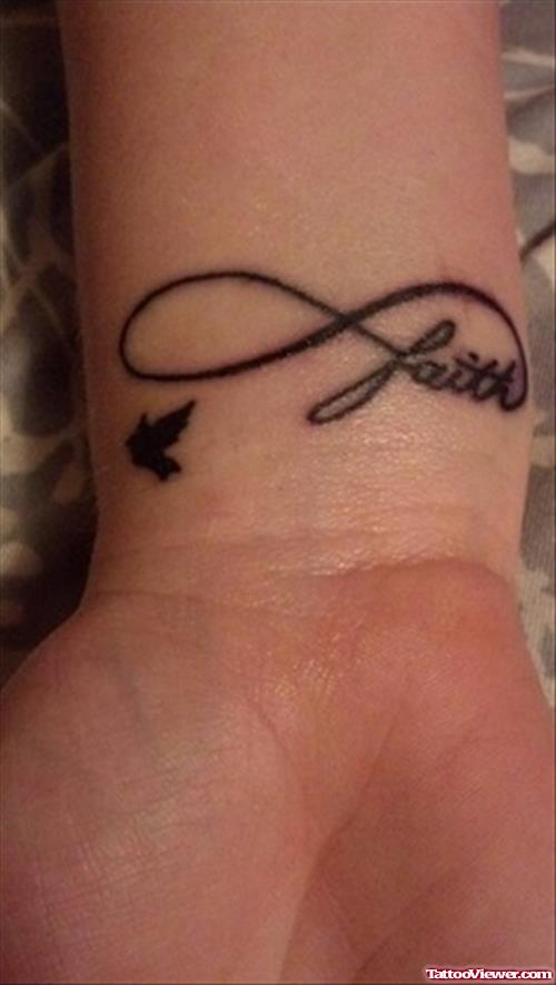 Tiny Bird And Infinite Faith Tattoo On Girl Wrist