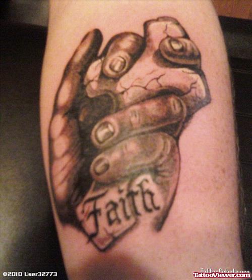 Grey Ink Hand And Faith Cross Tattoo