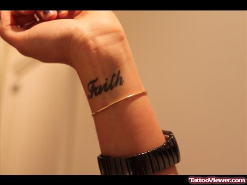 Girl Showing Faith Tattoo On Wrist