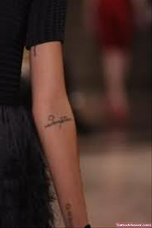 Faith Tattoo On Arm Joint