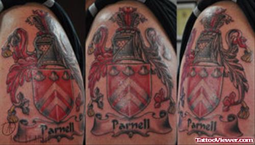 Colored Family Crest Tattoo On Shoulder For Men