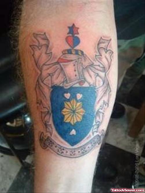 Beautiful Colored Family Crest Tattoo On Forearm