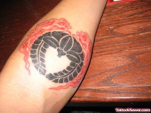 Black And Red Ink Family Crest Tattoo On Left Arm