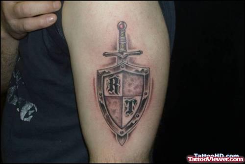 Amazing Grey Ink Family Crest Tattoo On Left Half Sleeve