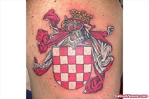 Red Ink Family Crest Tattoo On Shoulder