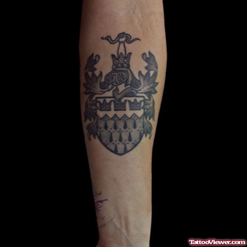 Grey Ink Family Crest Tattoo On Left Arm