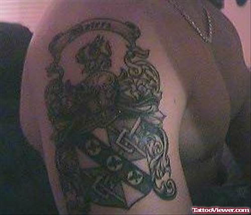 Attractive Family Crest Tattoo On Right Shoulder
