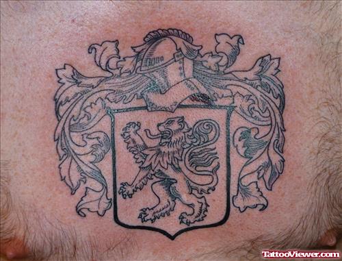 Grey Ink Family Crest Tattoos On Man Chest