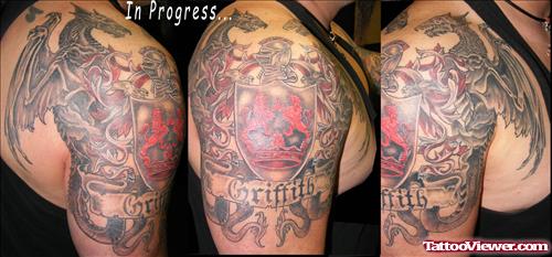 Dragons And Family Crest Tattoo On Half Sleeve