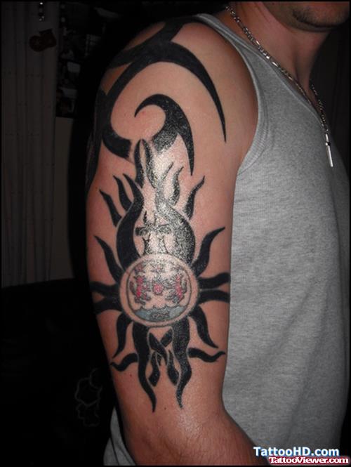 Tribal Sun And Family Crest Tattoo On Half Sleeve
