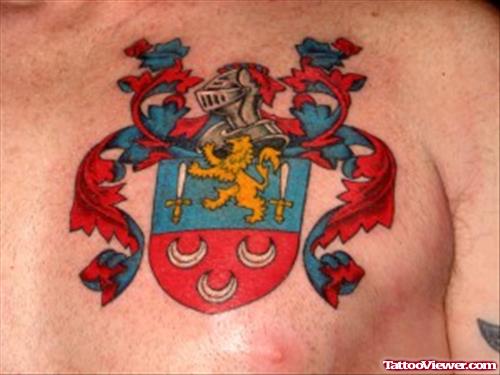 Man Chest Red Ink Family Crest Tattoo