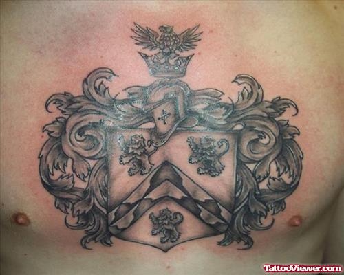 Attractive Grey Ink Family Crest Tattoo On Man Chest