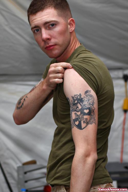 Grey Ink Man Left Half Sleeve Family Crest Tattoo