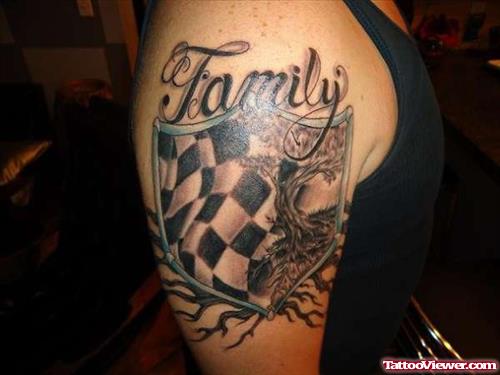 Family Crest Tattoo On Man Right Bicep
