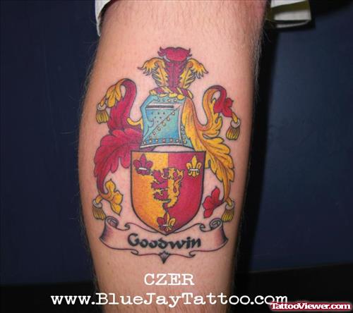 Colored Family Crest Tattoo On Leg