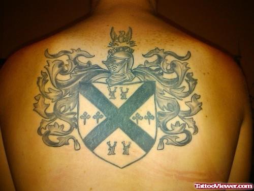 Black And Grey Ink Family Crest Tattoo On Upperback