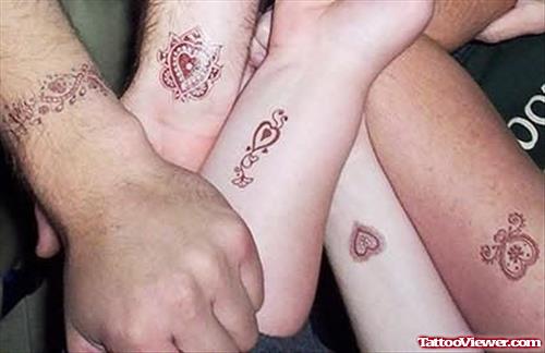 Family Hearts Tattoo On Arms