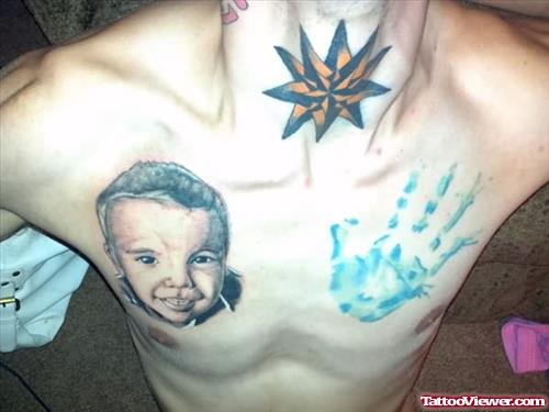 Family Hand And Face Tattoo On Chest