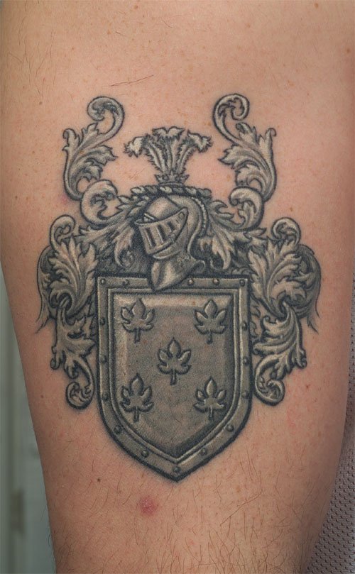 Grey Ink Family Crest Tattoo On Sleeve