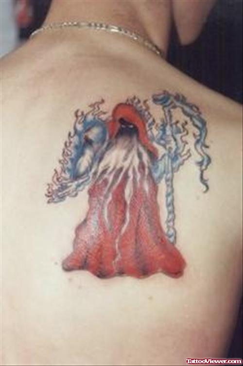 Colored Grim Reaper Fantasy Tattoo On Back Shoulder