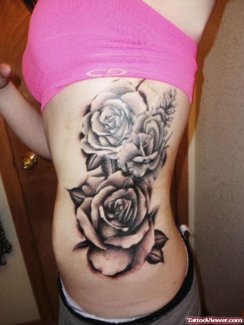 Grey Rose Flowers Fantasy Tattoo On Side Rib