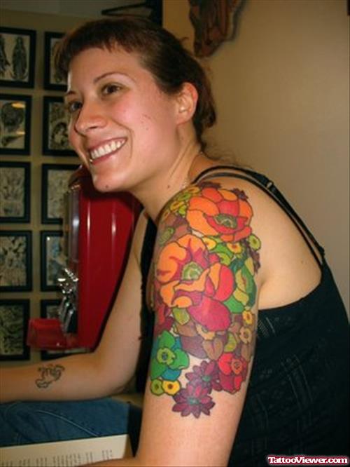Colored Flowers Left Half Sleeve Fantasy Tattoo