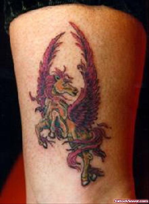 Winged Fantasy Tattoo On Thigh