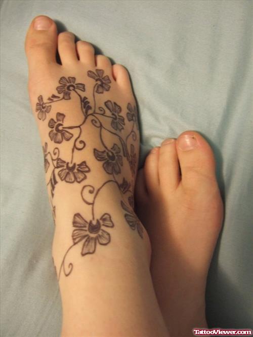 Grey Ink Flowers Fantasy Tattoo On Right Foot