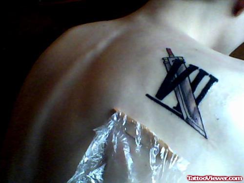 Roman Numeral Fantasy Tattoo On Right Back Shoulder