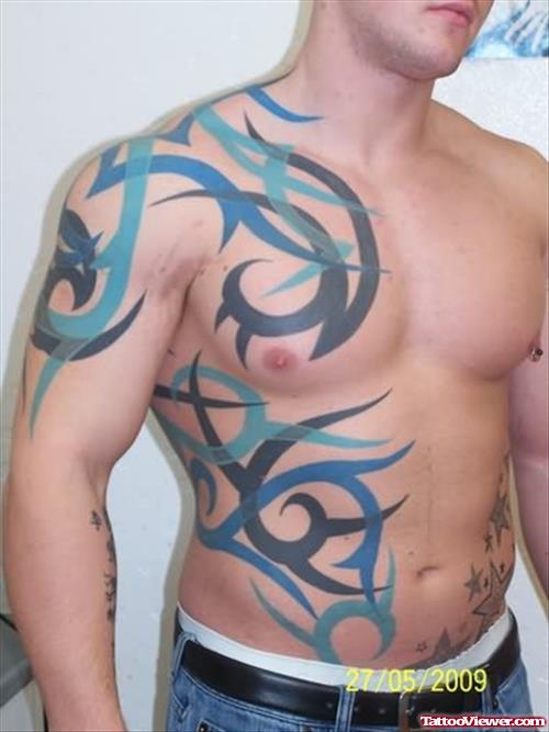 Tribal Fantasy Tattoo On Man Side Rib