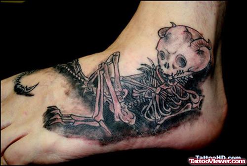 Grey Ink Skeleton Fantasy Tattoo On Left Foot