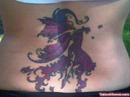 Purple Ink Fairy Fantasy Tattoo On Lowerback