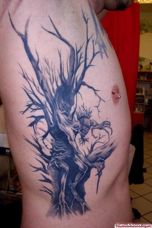 Grey Ink Tree Fantasy Tattoo On Side Rib