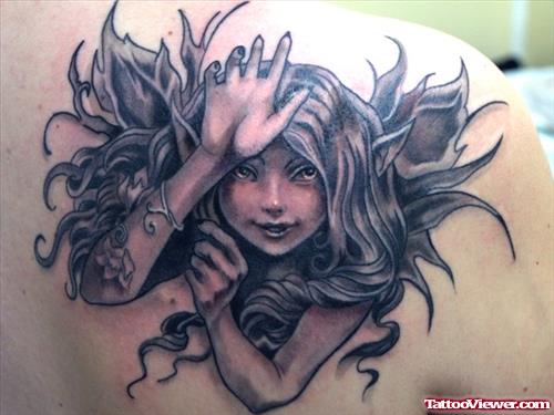 Grey Ink Fantasy Girl Head Tattoo On Back Shoulder
