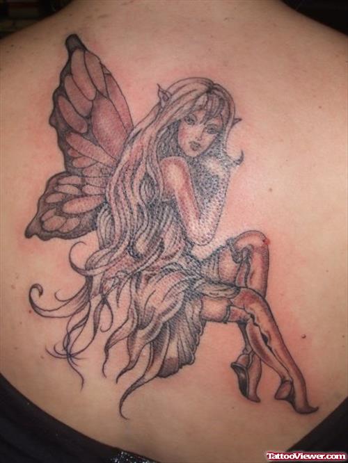 Grey Ink Fairy Fantasy Tattoo On Upperback