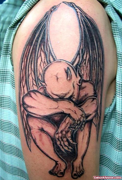 Grey Ink Sad Gargoyle Fantasy Tattoo On Half Sleeve