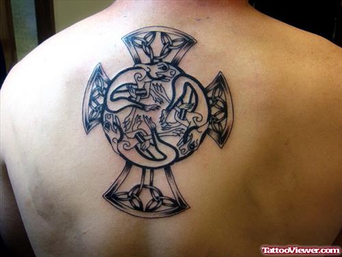 Grey Ink Celtic Irish Cross Fantasy Tattoo On Back