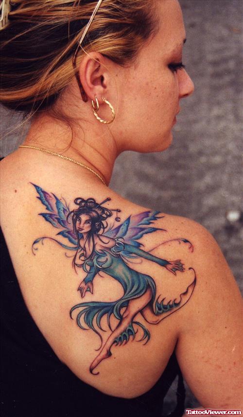 Blue Ink Fairy Fantasy Tattoo On Back Shoulder