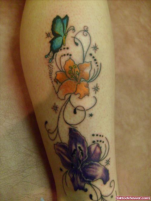 Colored Flowers And Butterfly Fantasy Tattoo